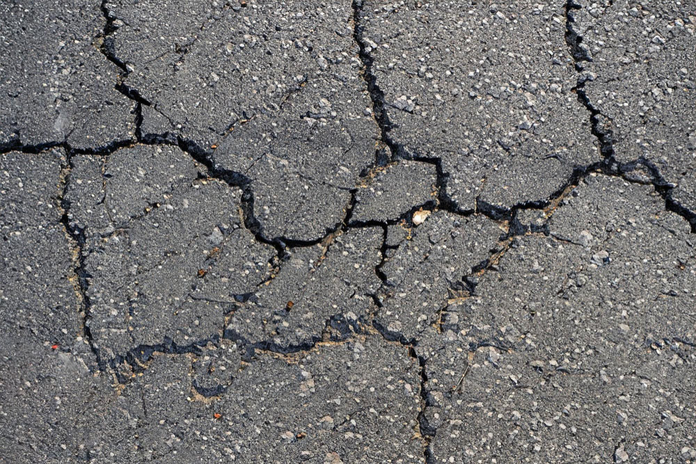 The Importance of Repairing Asphalt Cracks