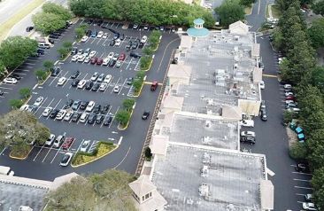 Aerial view of a freshly paved commercial property